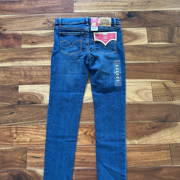 Levi’s 710 super skinny size 8 girl jeans. Medium wash.  NWT - Picture 3 of 5